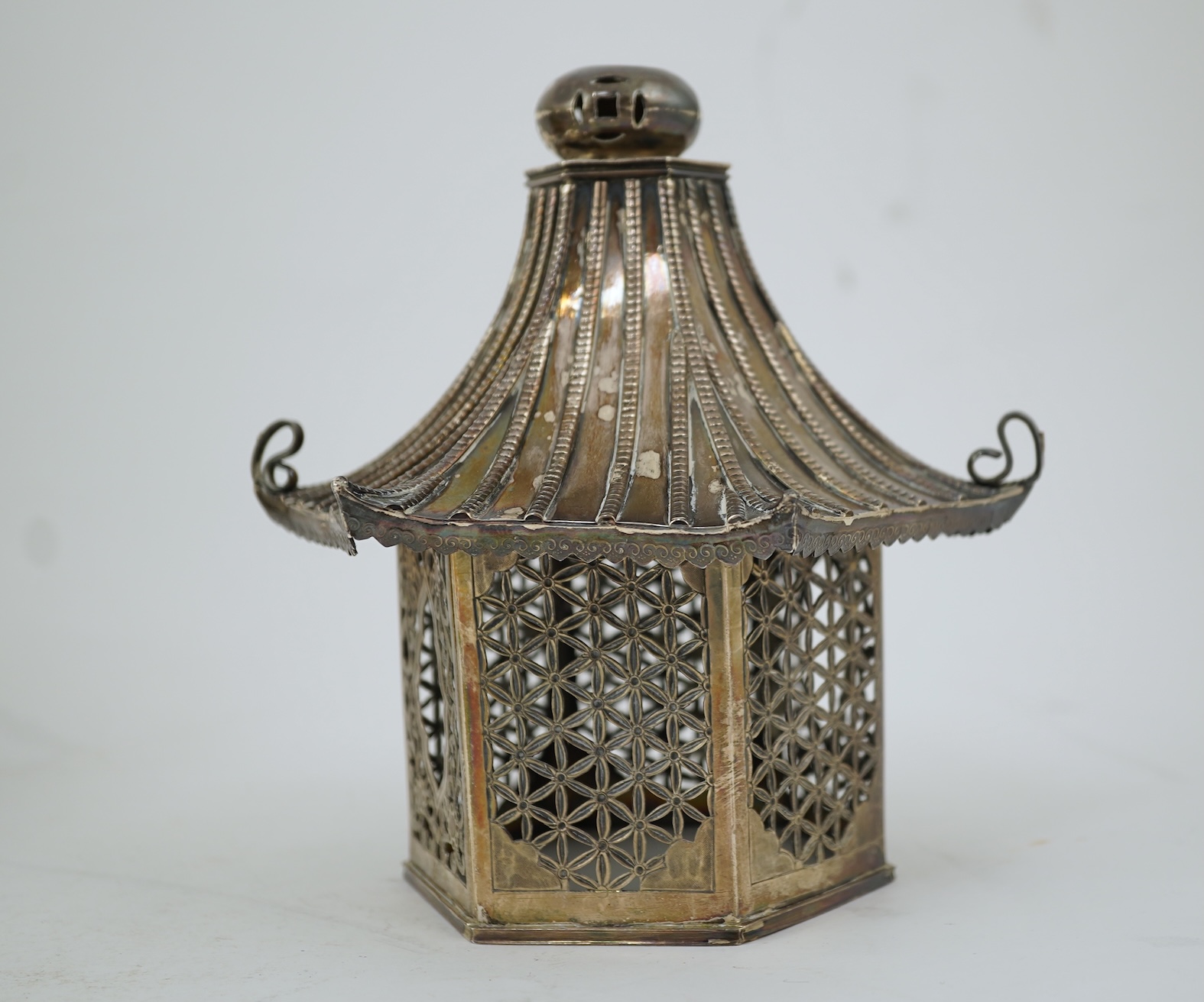 An unusual Chinese silver tripod censer with pagoda shaped cover, ding, early 20th century
